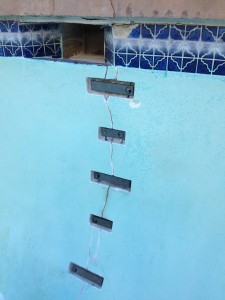 Torque Lock Staples used to repair a swimming pool structural crack